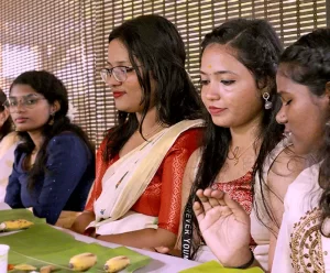 a group of women sitting at a table